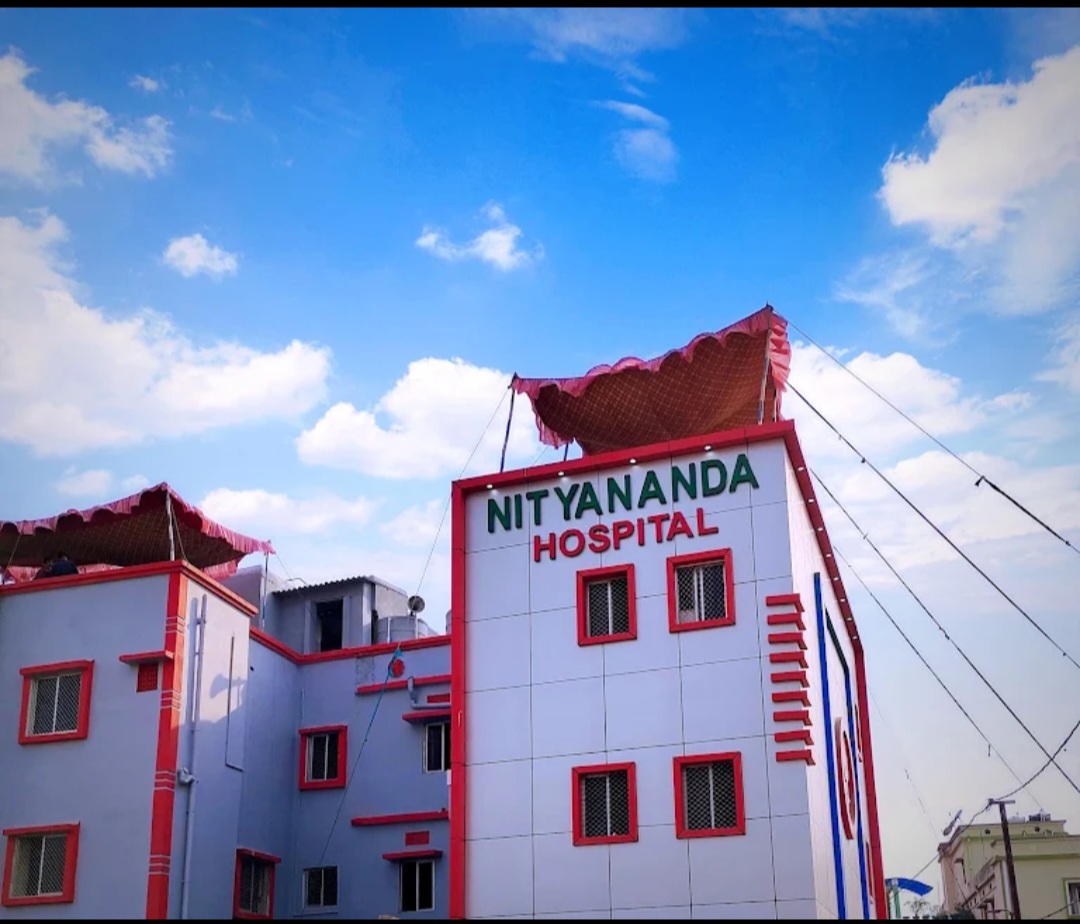 Nityananda Hospital building in Cuttack under a blue sky